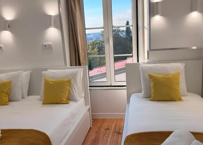 Quarto em Acomodações Particulares - Bairro Alto Centro Histórico D *